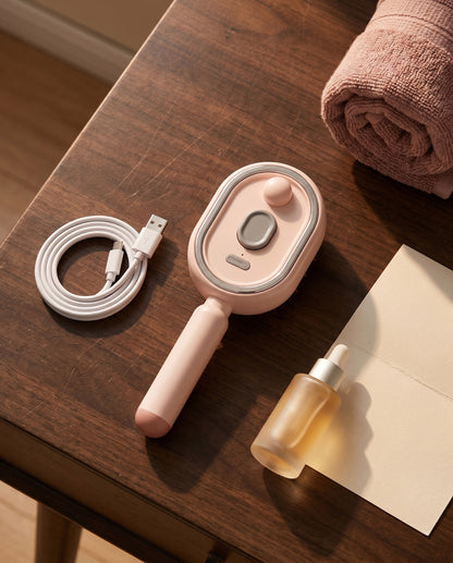 What's in the box — The Cloud brush, USB-C cable, essence dropper and quick-start card