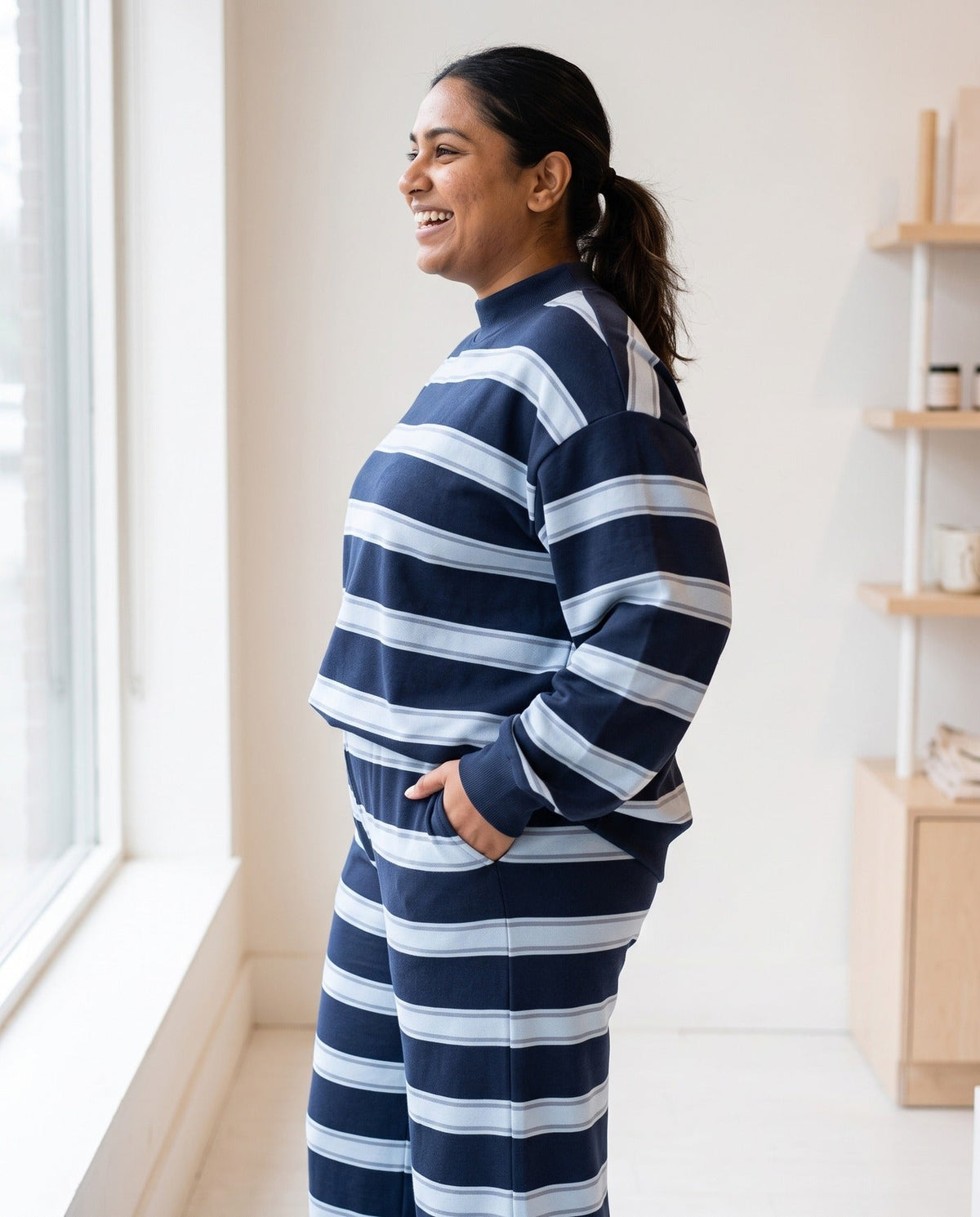 Side profile of The Sunday striped lounge set in Dark Blue