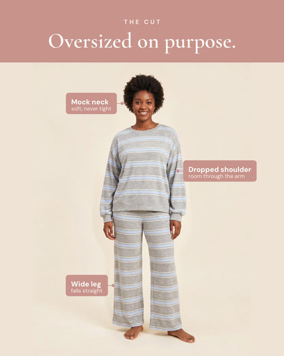 The cut — mock neck, dropped shoulder and a wide leg that falls straight